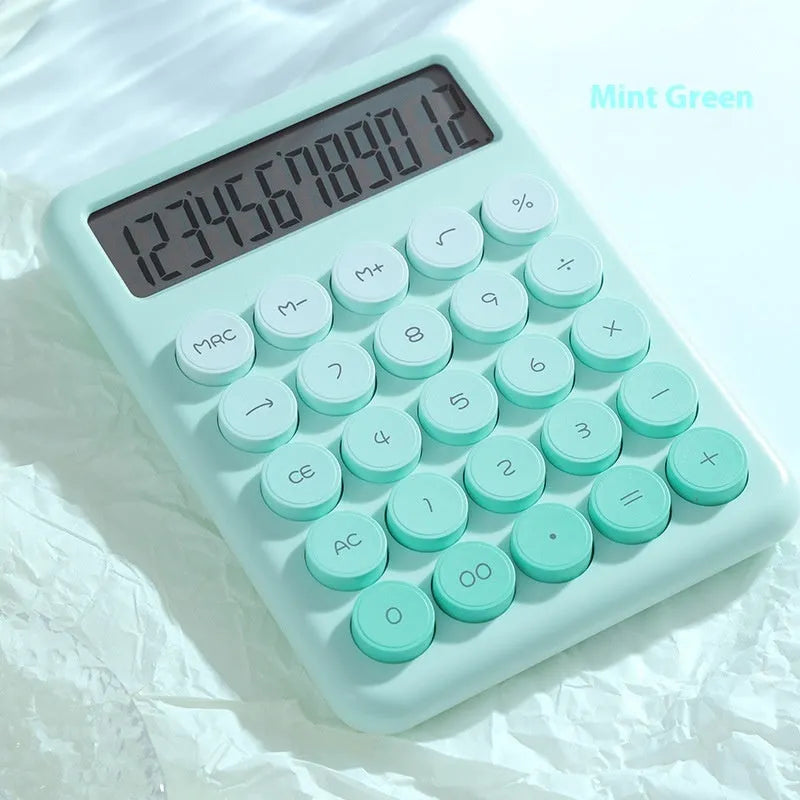 Dopamine gradient colour desk calculator in violet, cherry blossom powder, glacier blue, and mint green variants.