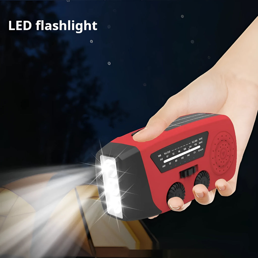Red rechargeable emergency hand radio torch with AM/FM radio, LED light, and USB power bank functionality