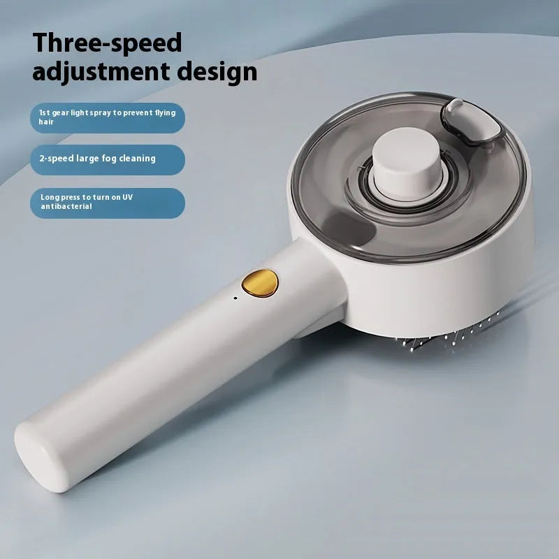 Ceramic white pet grooming brush with mist spray function and UV-C sterilisation light for dogs and cats.