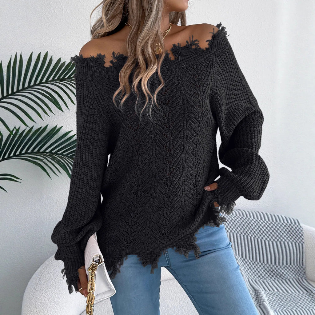 White hollow-out off-the-shoulder pullover sweater with long sleeves on model