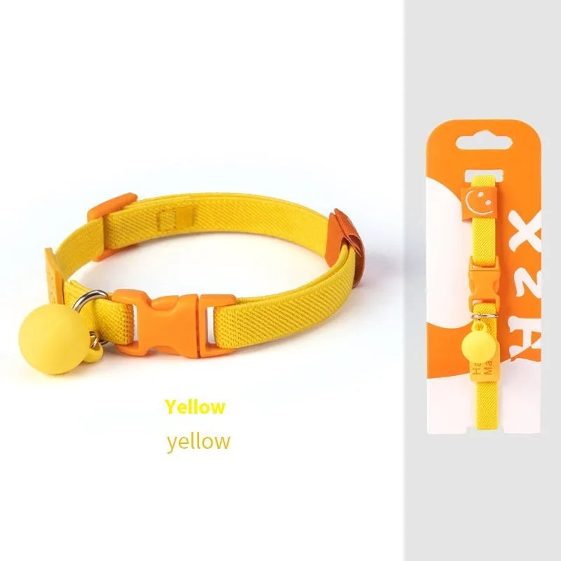 Small elastic polyester dog collar shown in various colours, adjustable from 22 to 32 cm for tiny dog breeds.