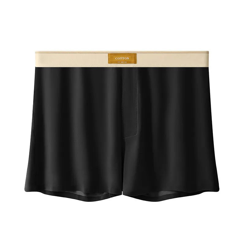 Men's loose fit ice silk underwear in solid colours showing mid-waist design and breathable fabric texture.