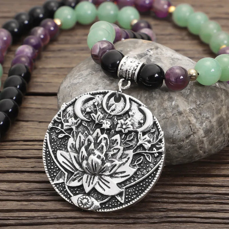 Yoga lotus pendant necklace with handmade stone beads and matching bracelet on adjustable chain.