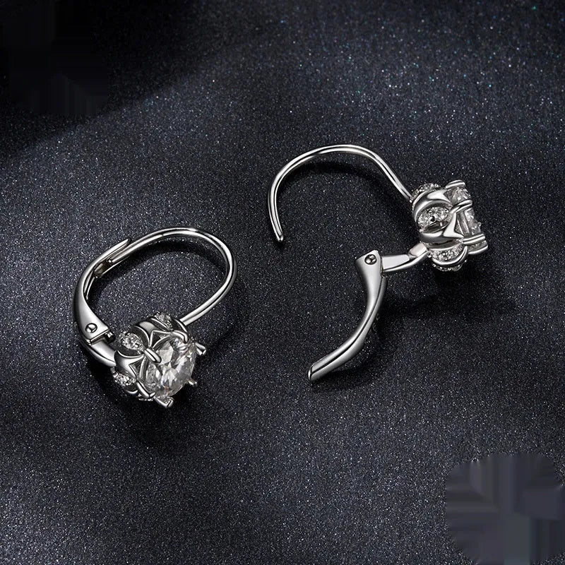 White gold plated sterling silver flower bud clip earrings with moissanite stone