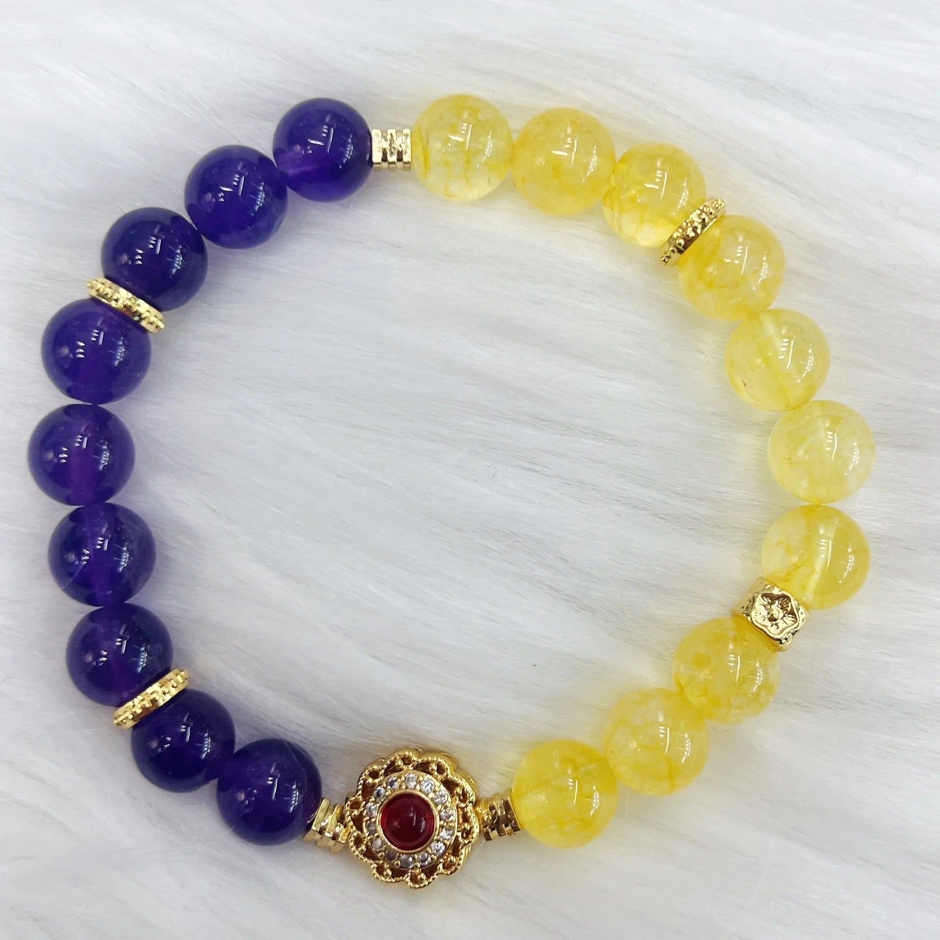 Handmade women's yellow and purple amethyst crystal bracelet with secure clasp fastening