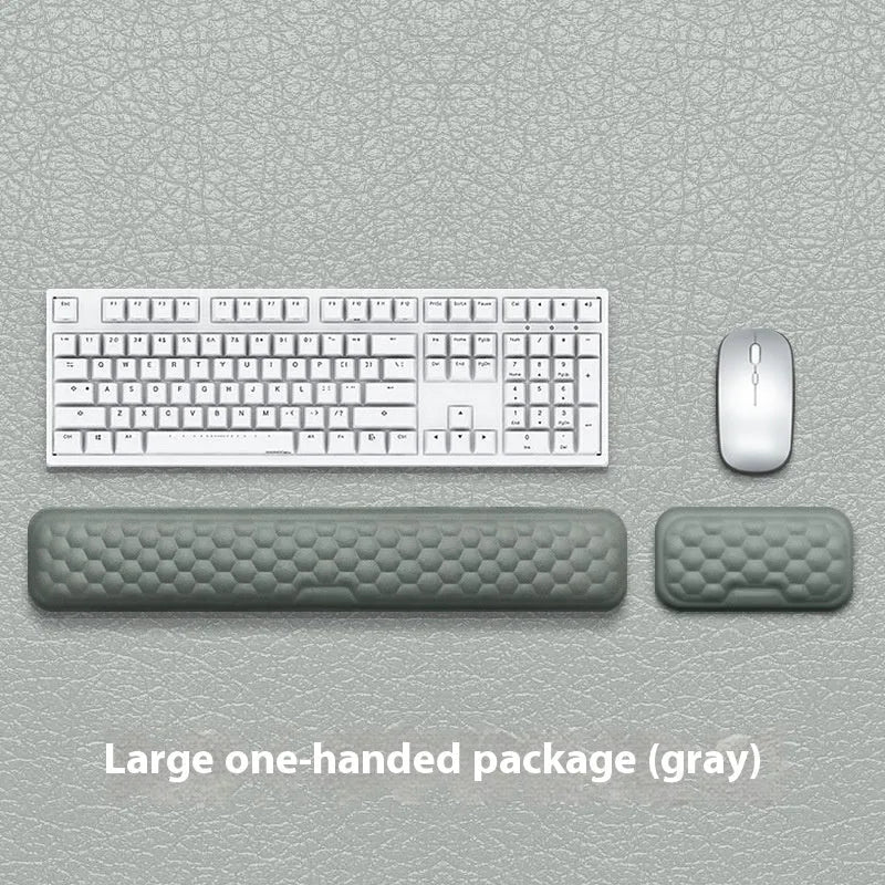 Memory foam mouse wrist rest pad with silicone base in black cloth cover option on desk