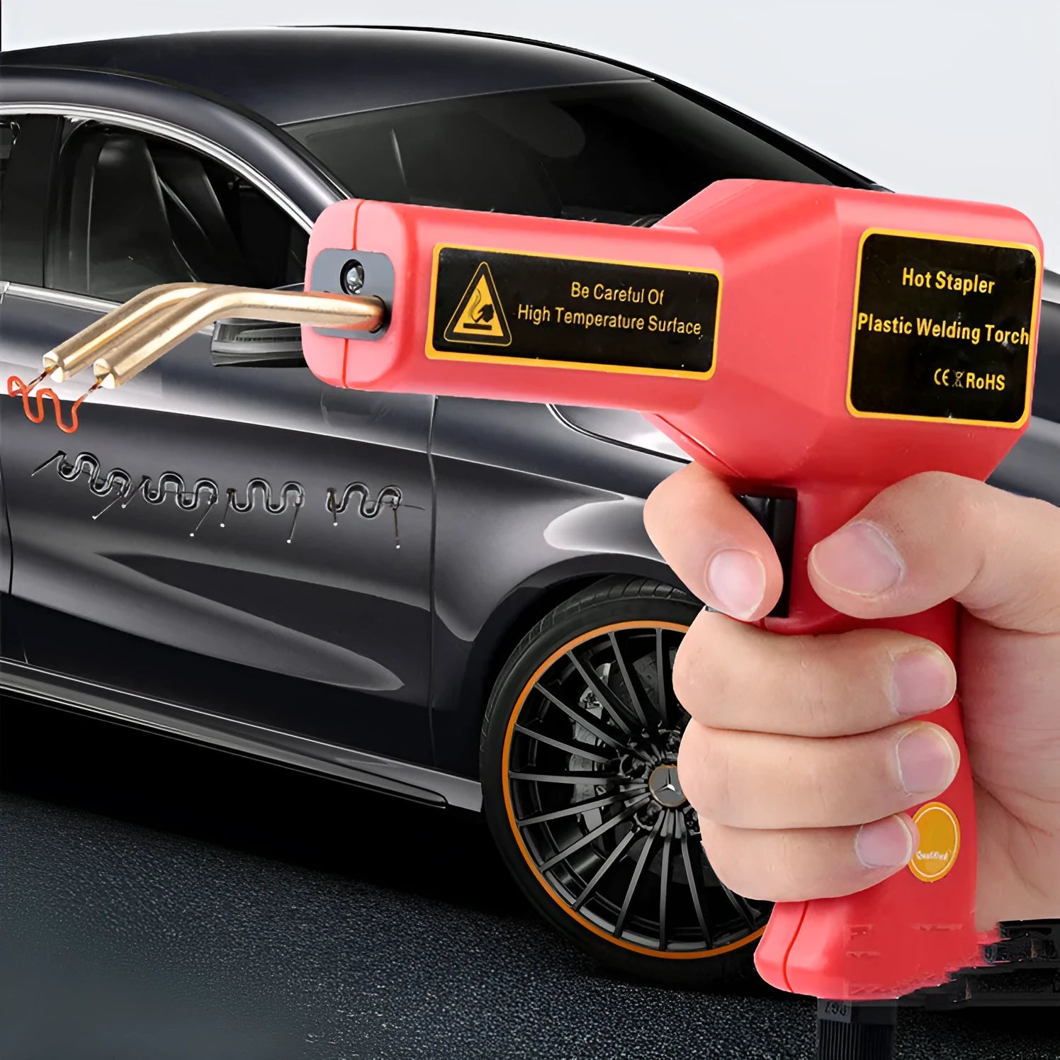 CR-307 black plastic welding gun with LED light, adjustable welding nails, and a long power cord for automotive repair.