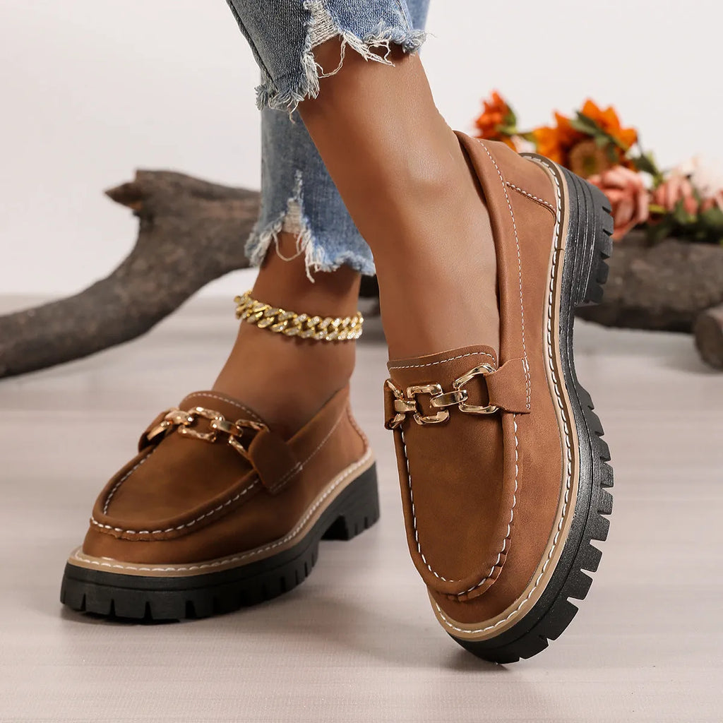 Women's flat bottom loafers with a thick platform heel in a solid colour, PU upper, and round toe shape.