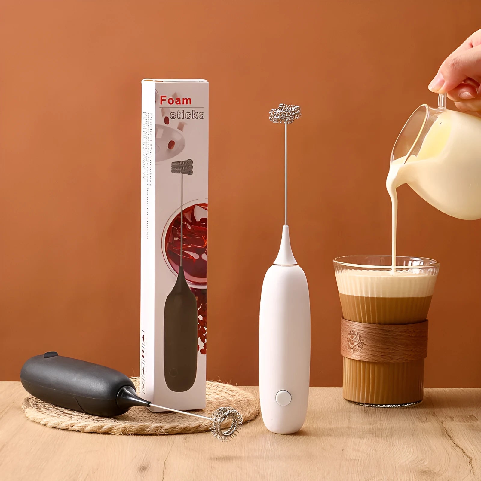 Black and white handheld electric milk frother blender for coffee milk frothing