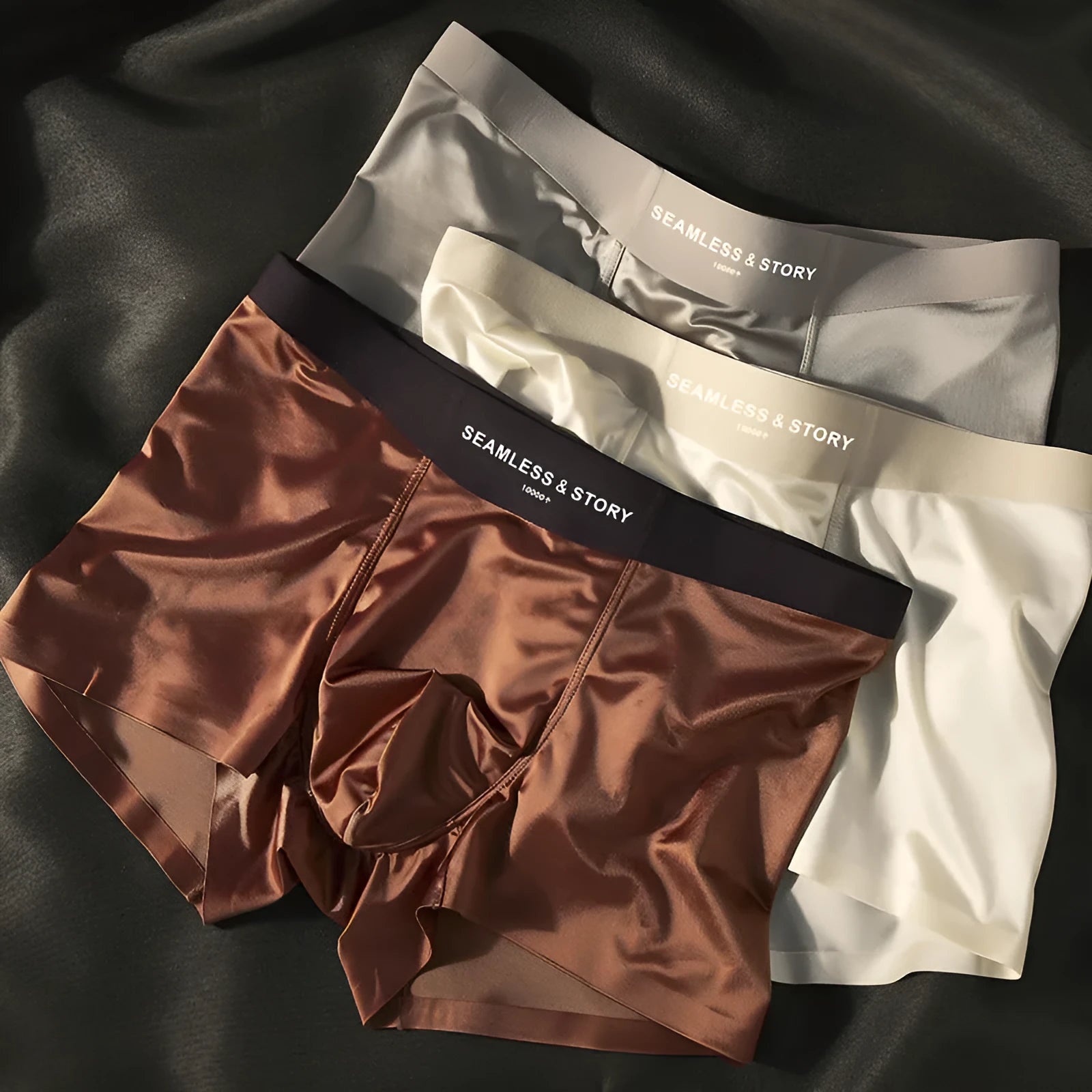 Men's ice silk satin underwear in mid waist design showing coffee, light grey and blue colour options