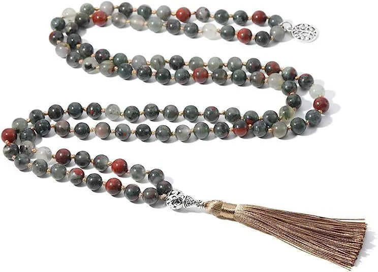 Handmade knotted beaded necklace with stone pendant showing 108 beads and geometric design