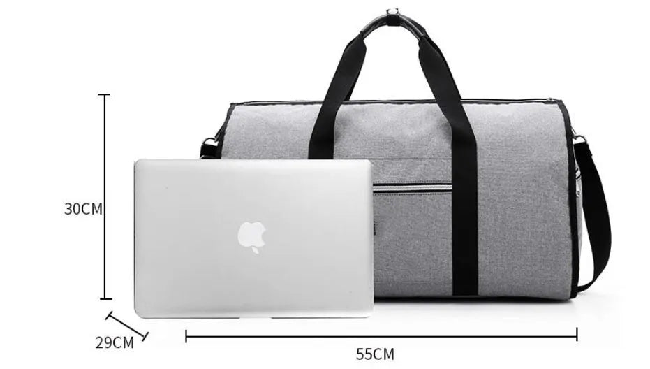 Medium sized cylindrical duffle travel bag in black, shown with zipper open, made from Oxford cloth.