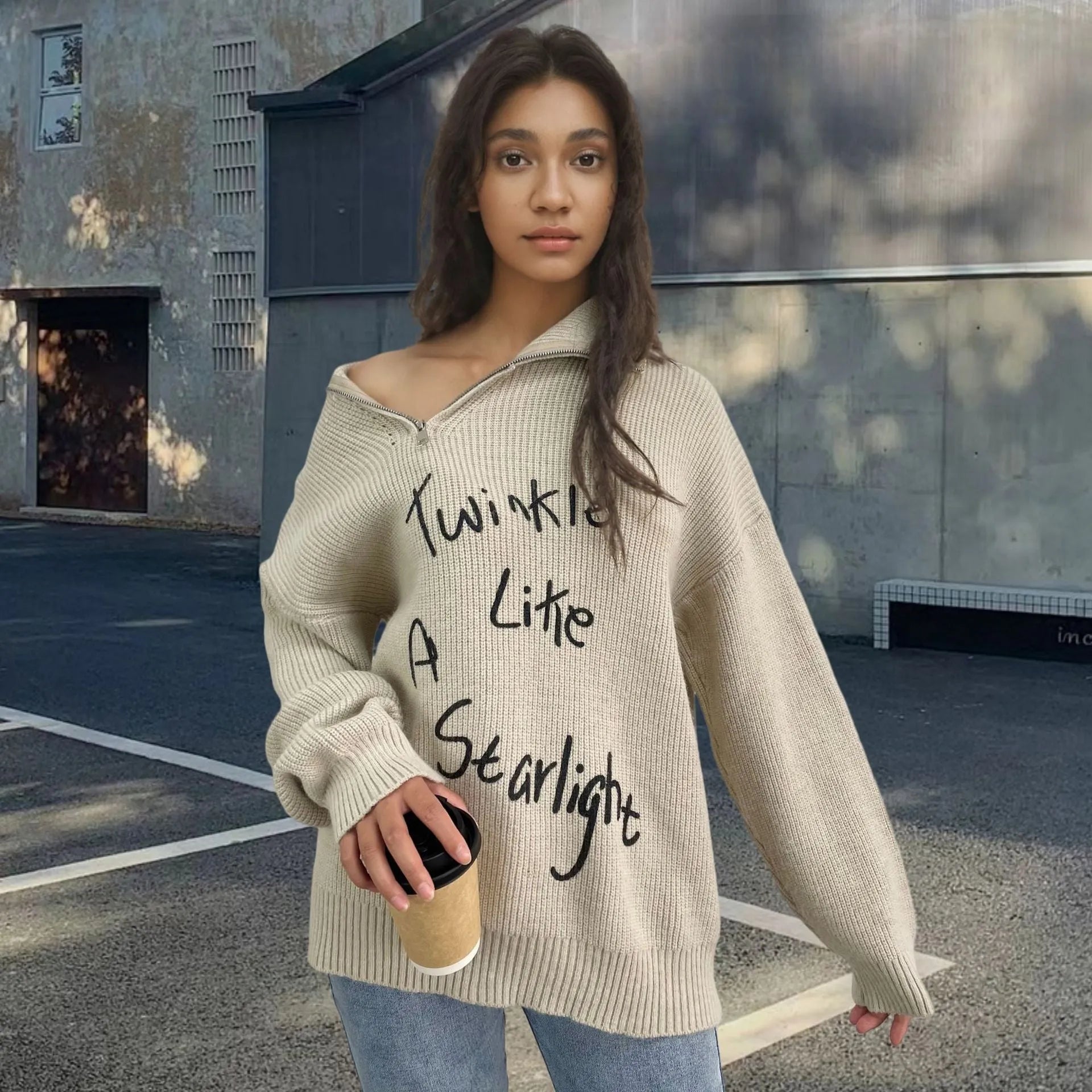 Women's grey alpaca wool pullover sweater with turtleneck, loose lapels, and an oblique diagonal zipper.