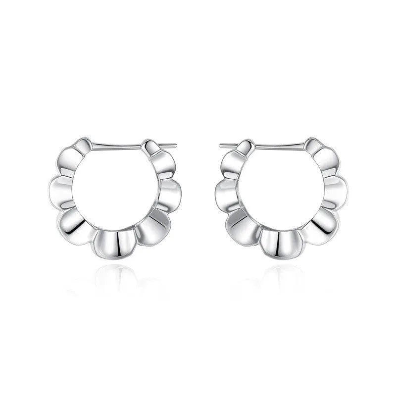 Pair of geometric sterling silver earrings with circular design element and electroplated finish