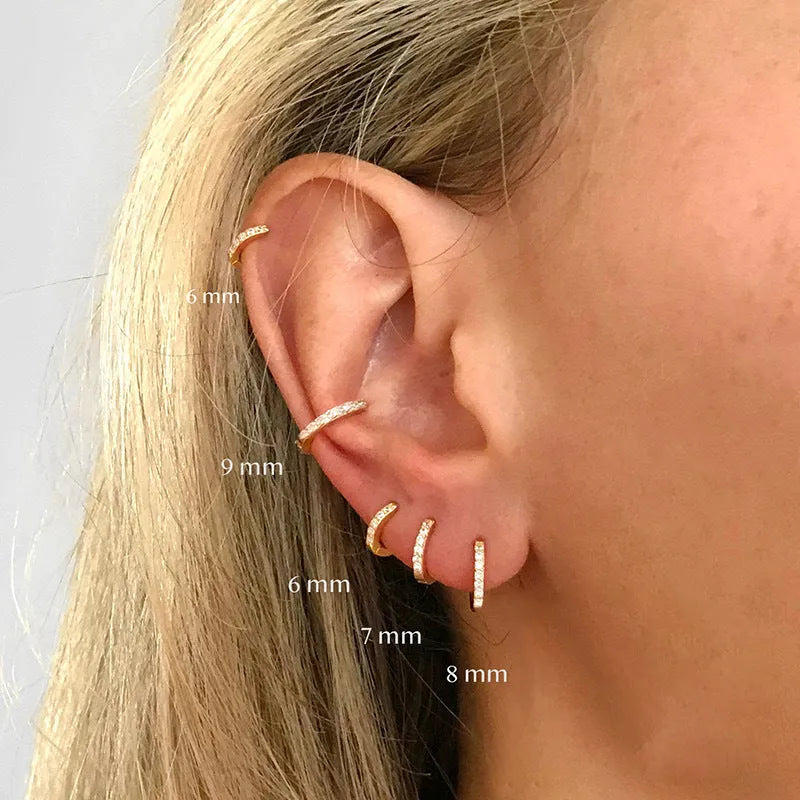 Circle zircon perforated stud earrings in gold, rose gold, and silver colours showing geometric round design with multiple size options