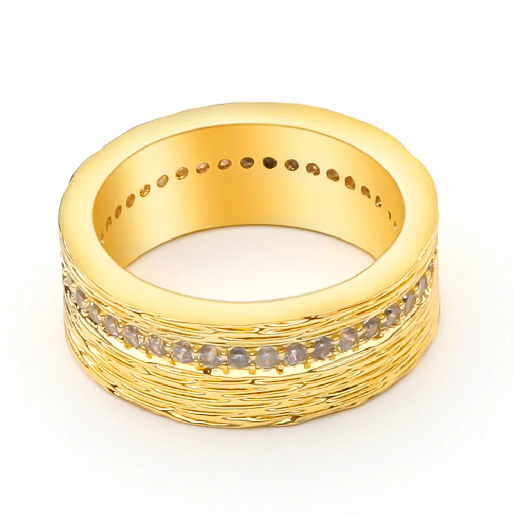 Gold geometric zircon ring with angular design on copper construction