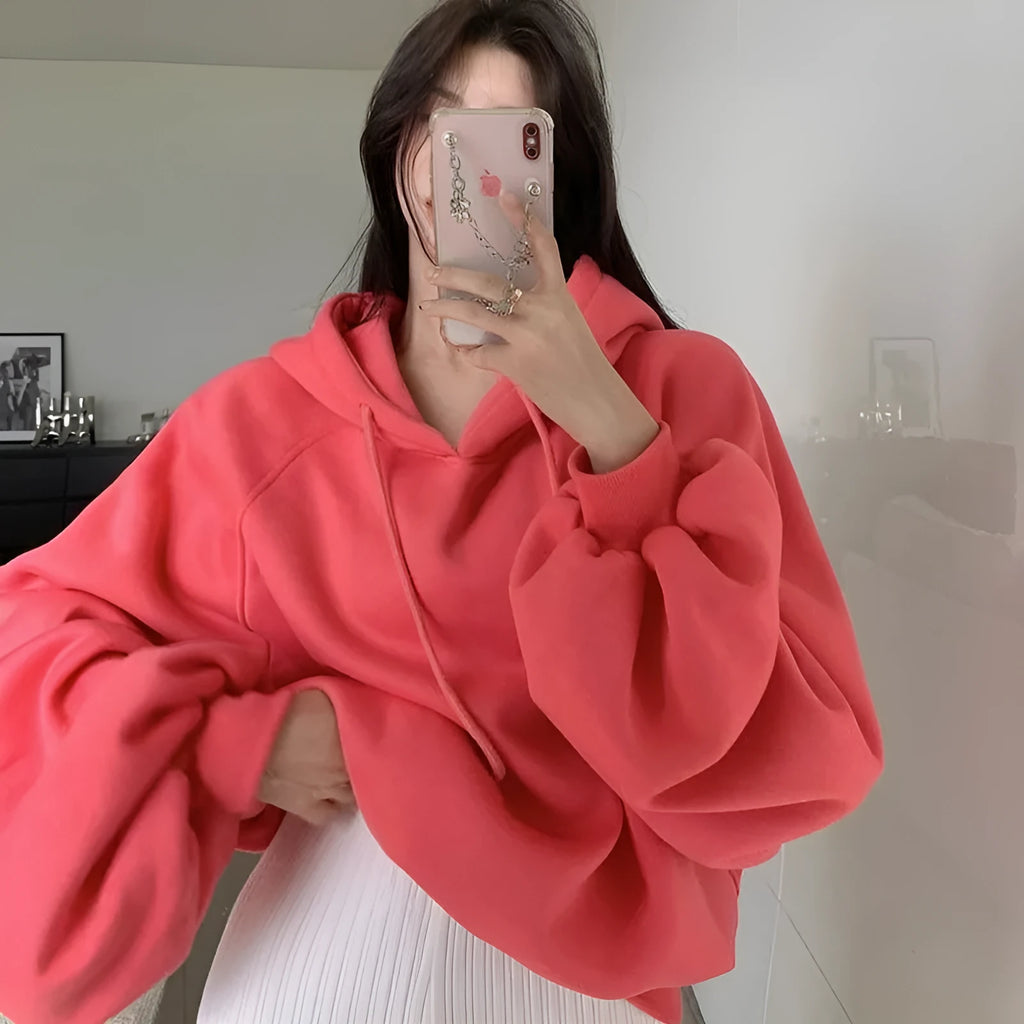Women's loose mulberry silk hooded sweater in solid watermelon red, sleeveless design.