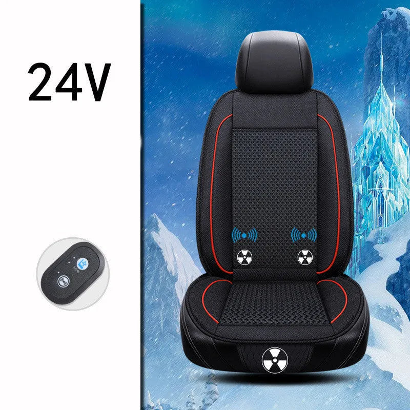 Square black car ventilation seat cushion with power cord on a car seat.