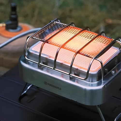 Compact metal outdoor electric heating stove with voltage regulator, shown in a silver finish.