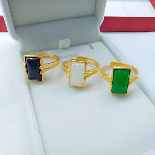 Adjustable brass gold-plated ring with gemstone in green, white or black options showing adjustable port mechanism