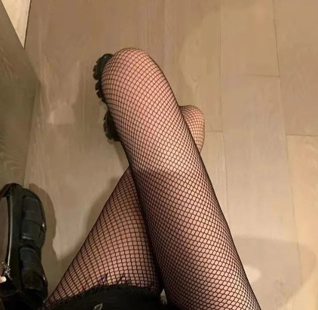 Women's summer mesh stockings in black and white, showing large, medium, and small net patterns.
