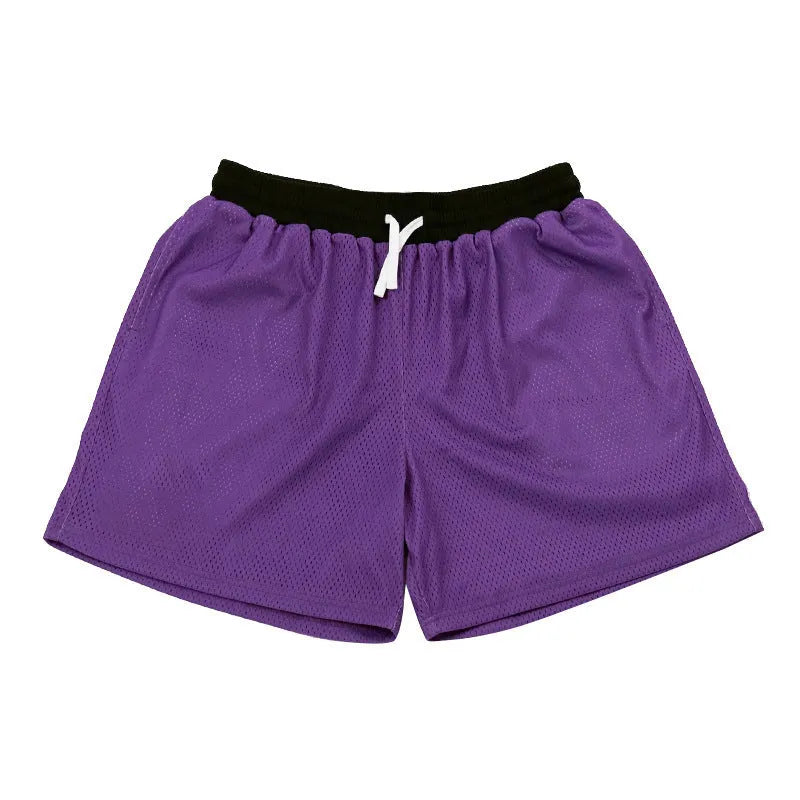 Men's solid colour mesh quick-drying sports shorts for running and fitness.