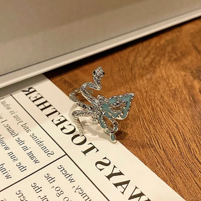 Copper Chinese butterfly women's ring showing creative design with oil dripping treatment finish