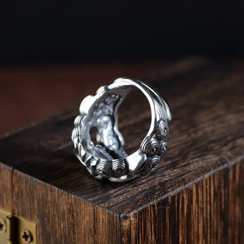 Silver open ring with detailed jibeast animal zodiac pattern and diamond details