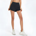Women's high-waist nylon fitness shorts in black, water blue or white colours