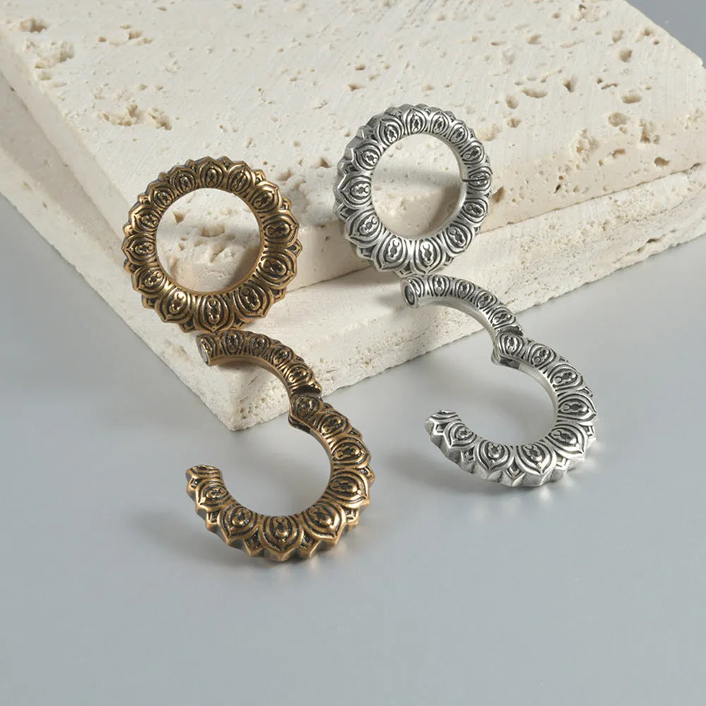 Retro heart-shaped hollow lotus magnetic earrings in stainless steel with antique finishes