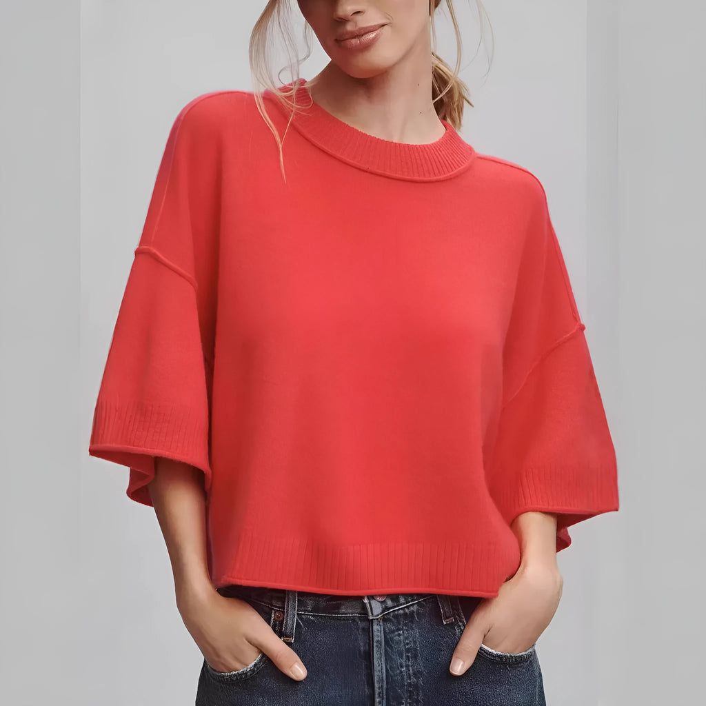 Red cropped viscose T-shirt with regular sleeves and an exposed navel design on a mannequin.