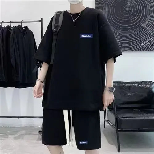 A waffle-textured leisure sports suit consisting of a short-sleeve top and shorts, shown in blue.