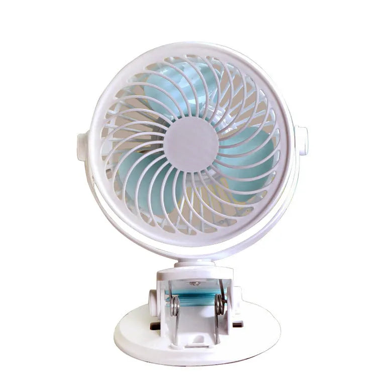 White USB desk fan with clip attachment and three blades, shown on a desk.