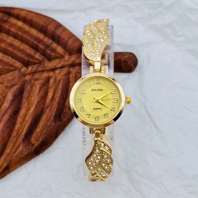 Stainless steel ladies watch with round dial on metal strap with Vachette clasp