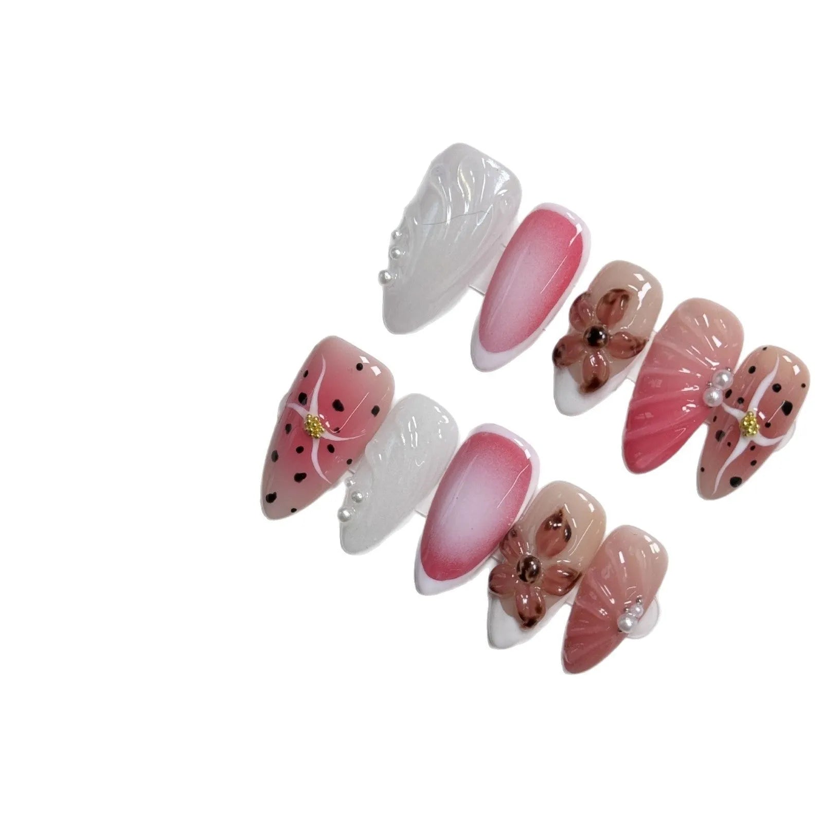 Hand-painted three-dimensional carved nail beauty patches showing embossed and candy patterns on almond-shaped nails