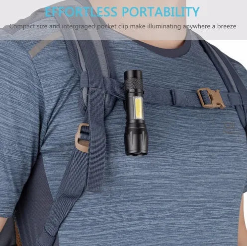Black aluminium alloy telescopic LED flashlight with pocket clip, shown zoomed in and out.