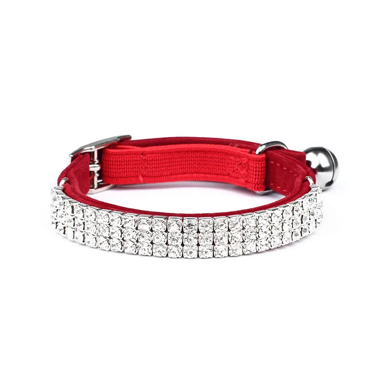 Velvet cat collar with rhinestones, shown in red colour, adjustable from 20 to 30 cm.