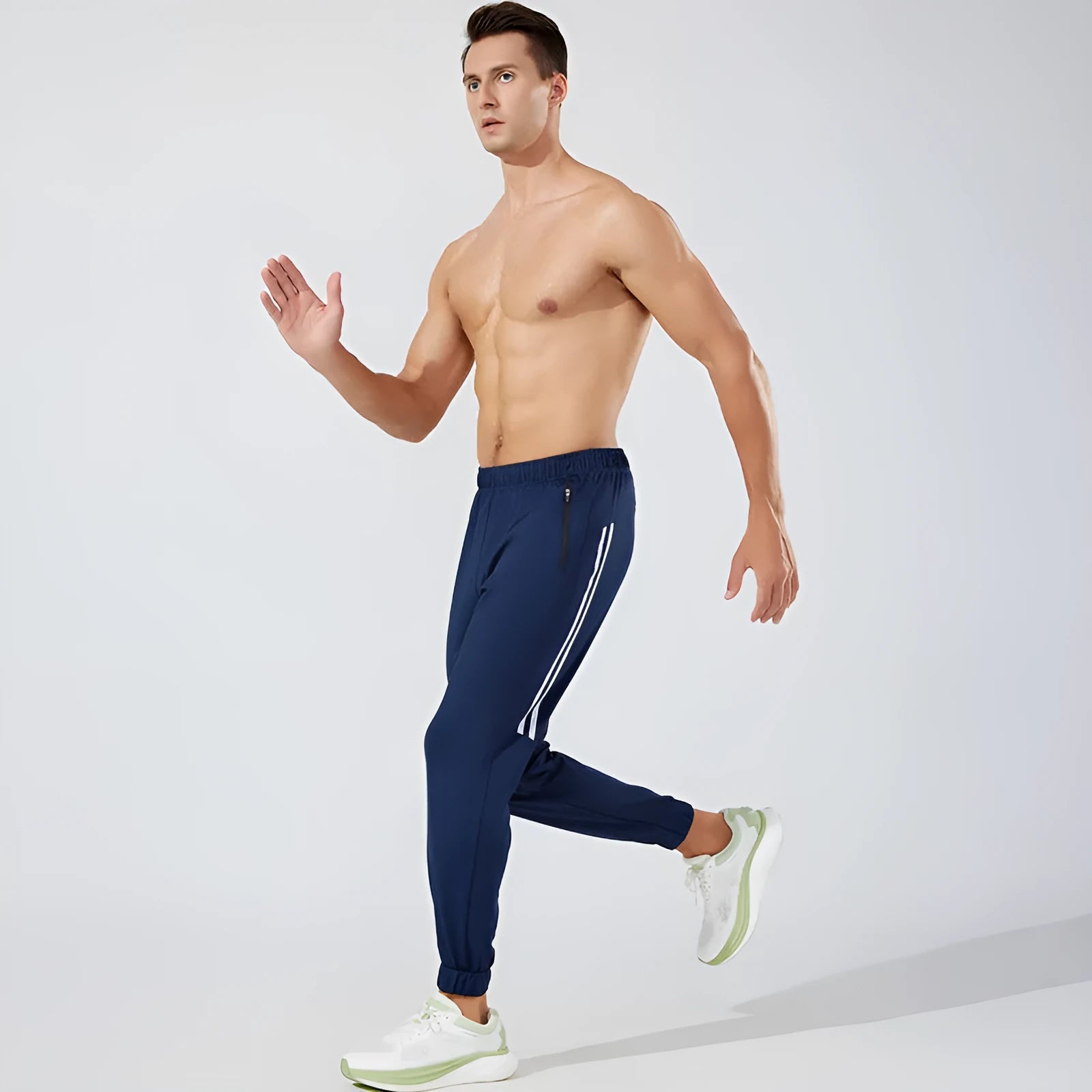 Men's black running trousers with mid waist design and polyester fabric for exercise activities