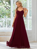 Women's light green sleeveless A-line banquet dress with long pleated skirt on a hanger.