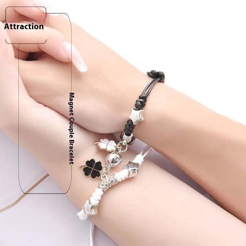 Magnetic couple bracelet pair with alloy electroplating in various designs including clover and crown patterns