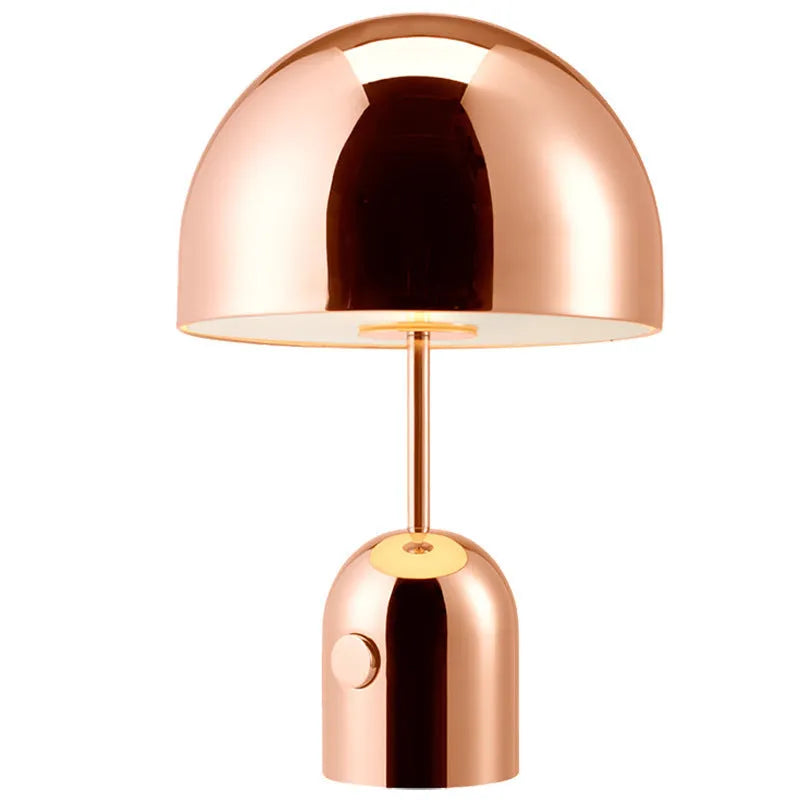 Post-modern metal base table lamp in rose gold finish measuring 280mm by 450mm