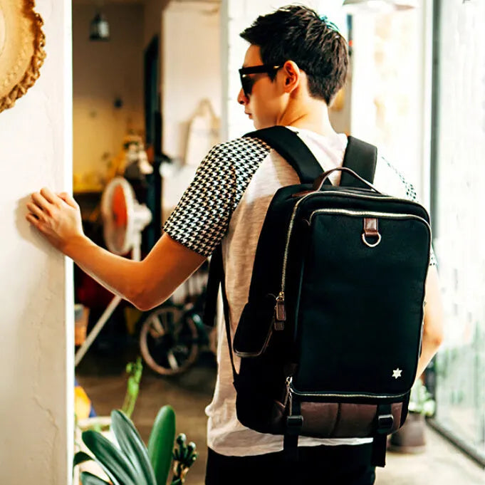 Korean style Oxford cloth men's backpack in seven colour options showing 30cm width by 16cm depth by 46cm height dimensions