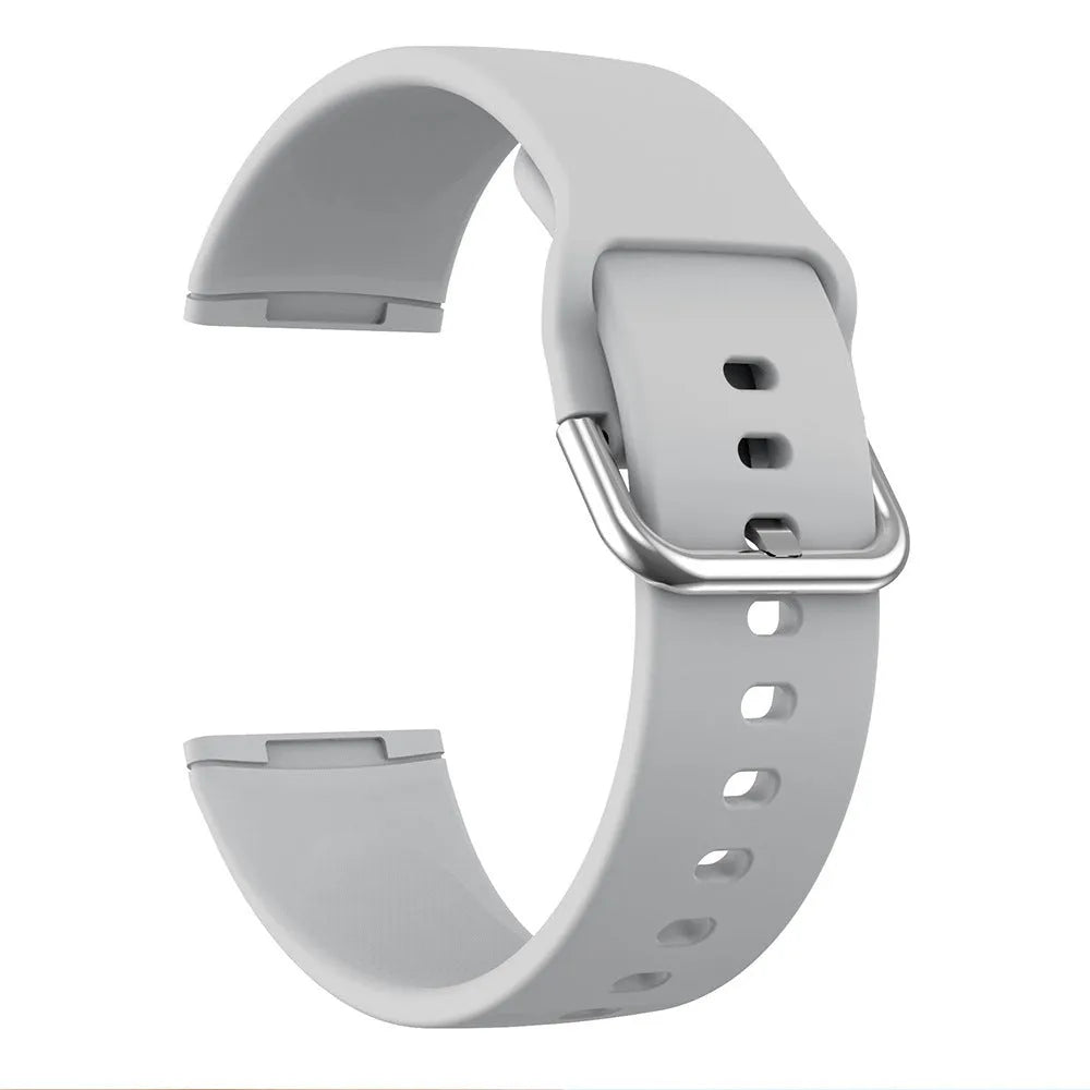 Silicone replacement strap with silver buckle for Fitbit Versa 3 and Sense 2 in multiple solid colour options.