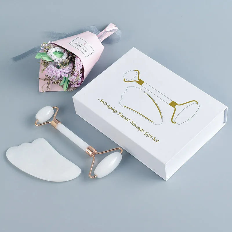 White jade facial roller and gua sha board set for skincare massage