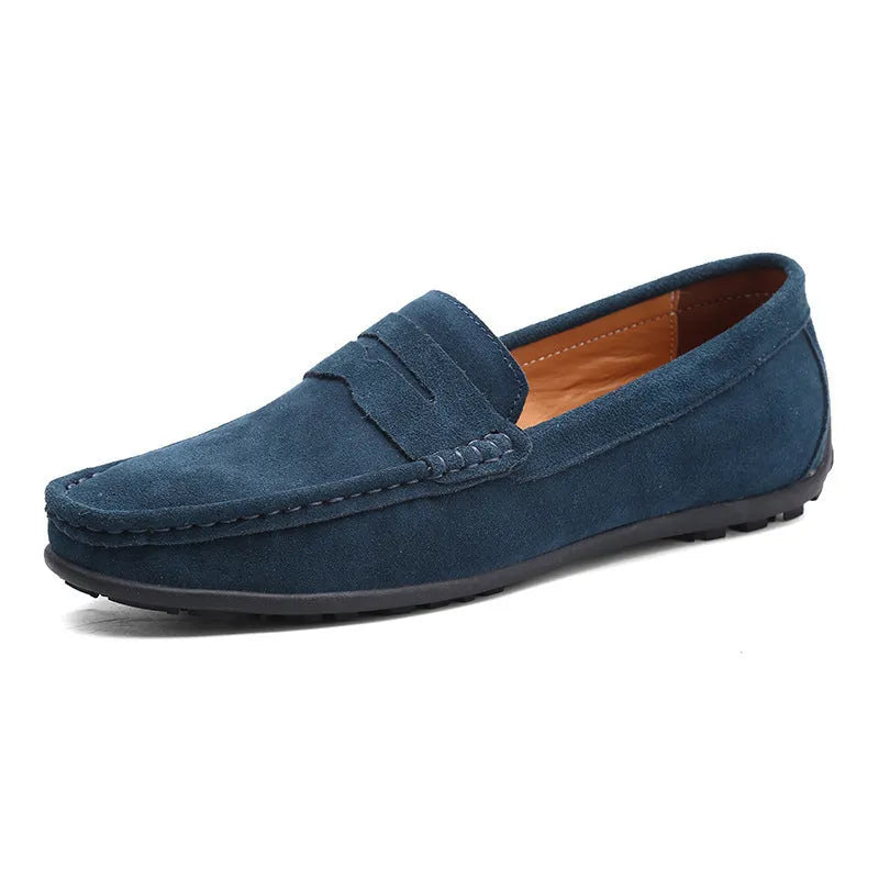 Men's suede Gommino-style loafers in a range of colours on a flat rubber sole.