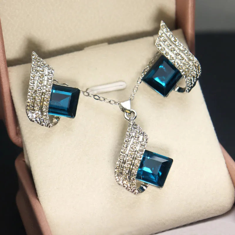 Women's necklace and earring set with cross chain design and glass pendant in alloy with electroplated finish