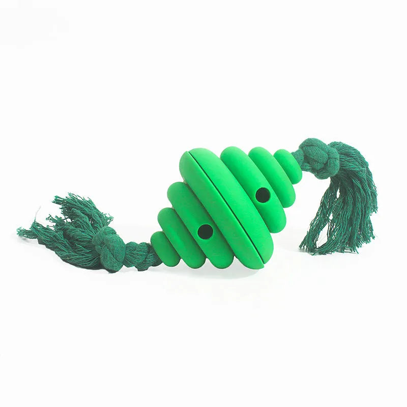 Large green and yellow silicone dog toy with a knotted rope and hollow ball for food dispensing.