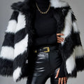 Women's lapel contrast colour coat with faux fur collar in picture colour, shown on model.