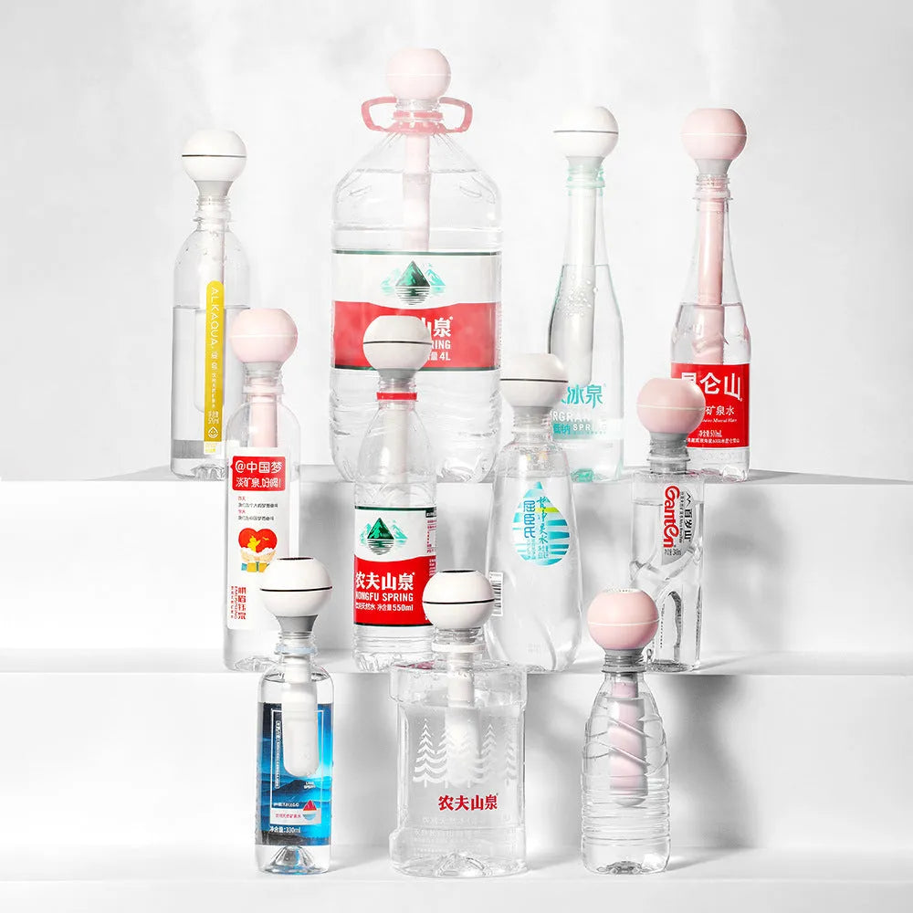 Columnar USB-powered ultrasonic humidifier with 1L tank in pink or white colours