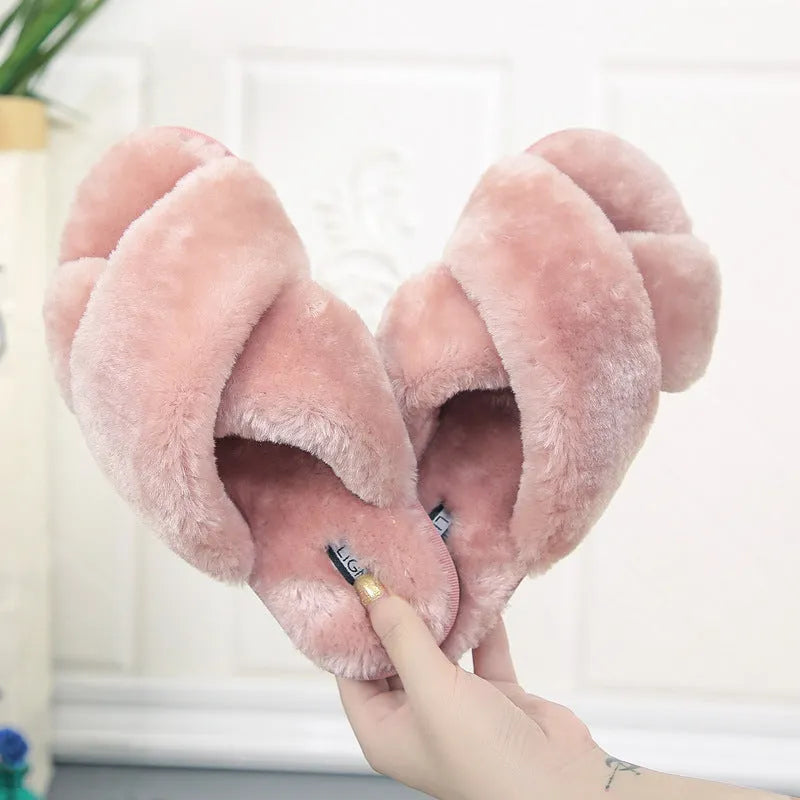 Cross open-toe fur slippers in black on a patterned non-slip sole